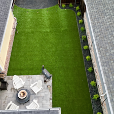 Backyard-Redesign-with-Artificial-Turf-Putting-Green-Landscape-Rock-Installation-in-McKinney-TX 15
