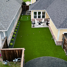 Backyard-Redesign-with-Artificial-Turf-Putting-Green-Landscape-Rock-Installation-in-McKinney-TX 16