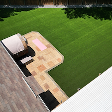 Full-Backyard-Artificial-Turf-Installation-with-Landscape-Rock-Border-in-Garland-TX 14